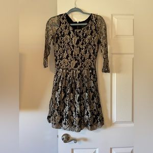 Maeve Dress. Beautiful black dress with gold overlay.